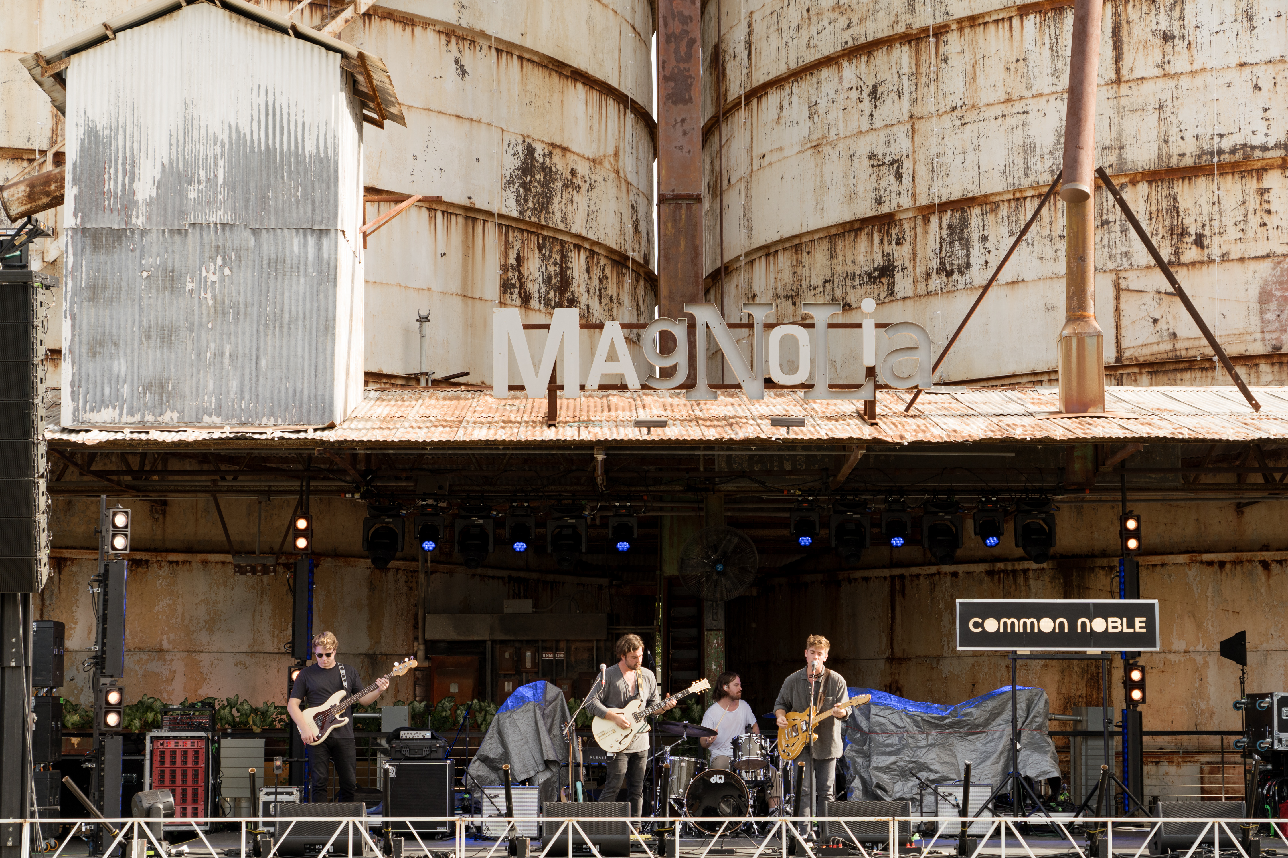 A band performing on the Magnolia Lawn live stage.