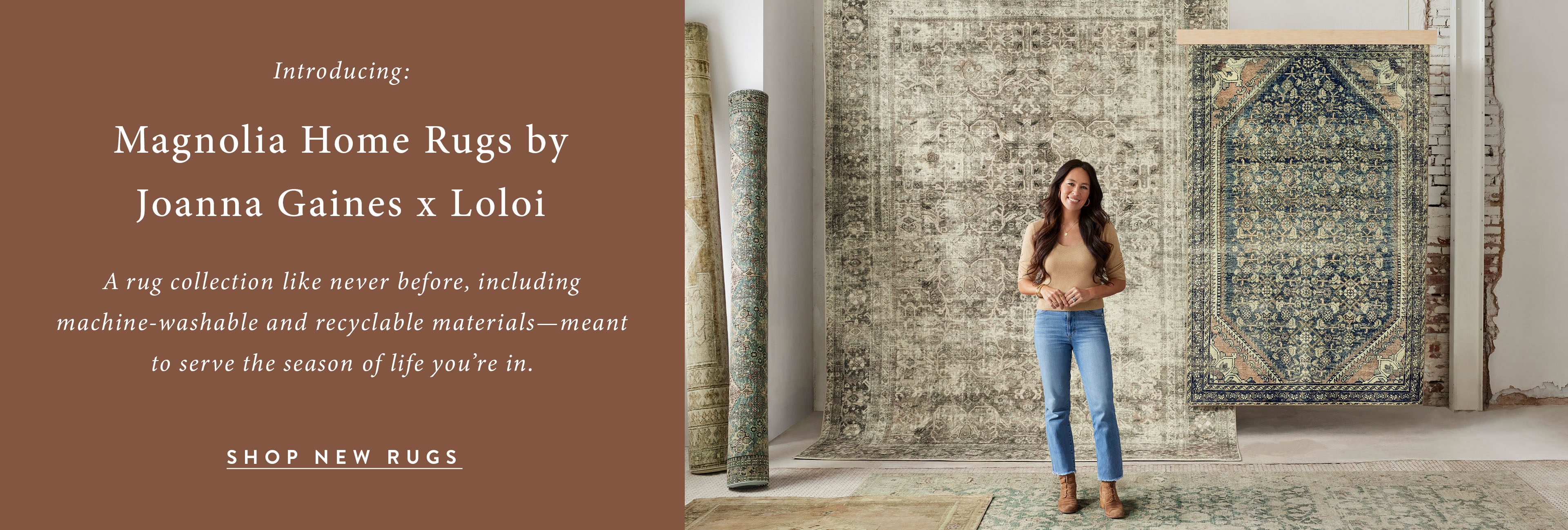 Magnolia Home Rugs by Joanna Gaines x Loloi. Joanna gaines stands in front of rugs hanging on walls