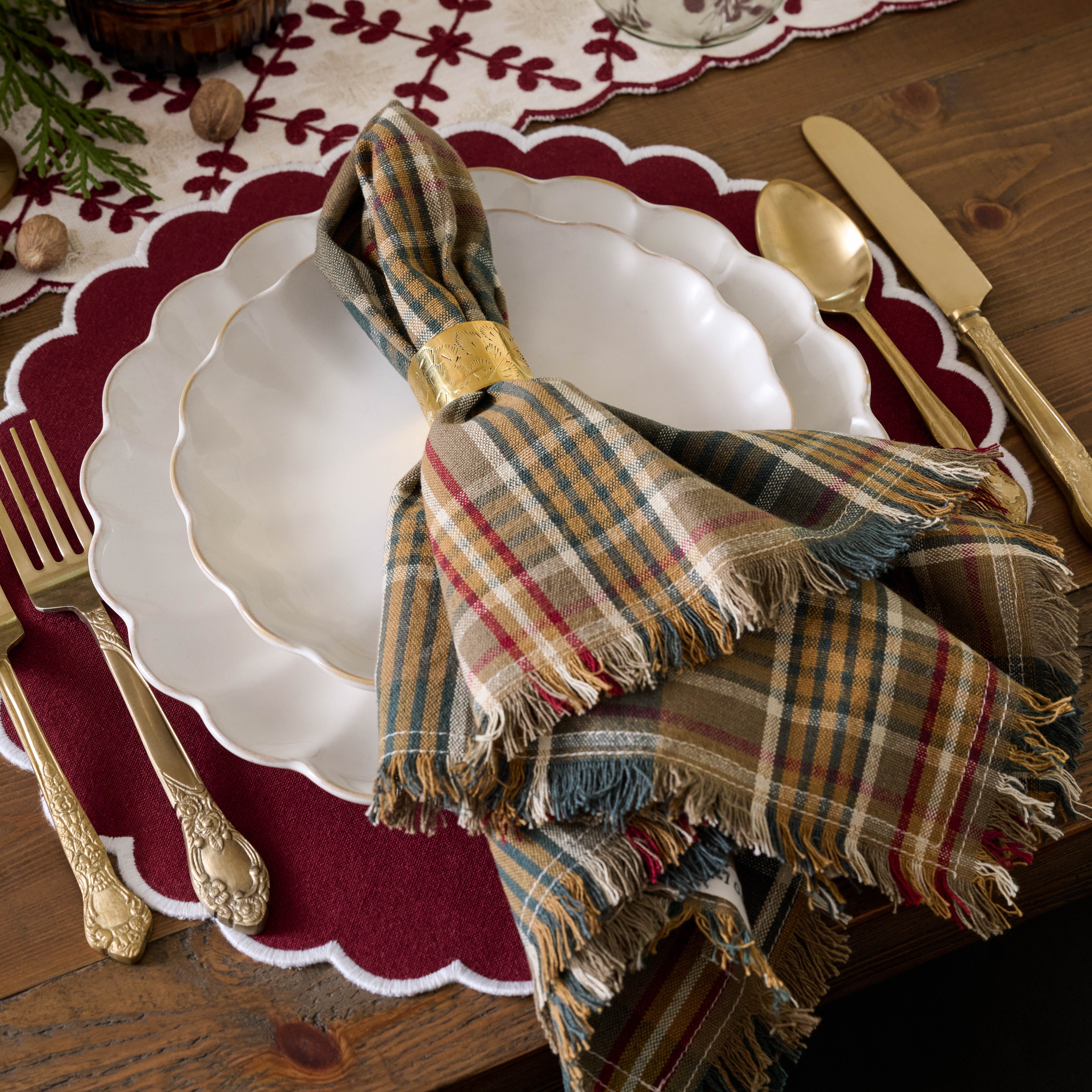 holiday table setting with placemat and plates