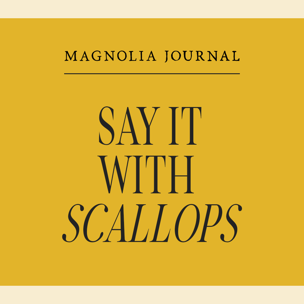 Yellow graphic with dark text that reads "say it with scallops."