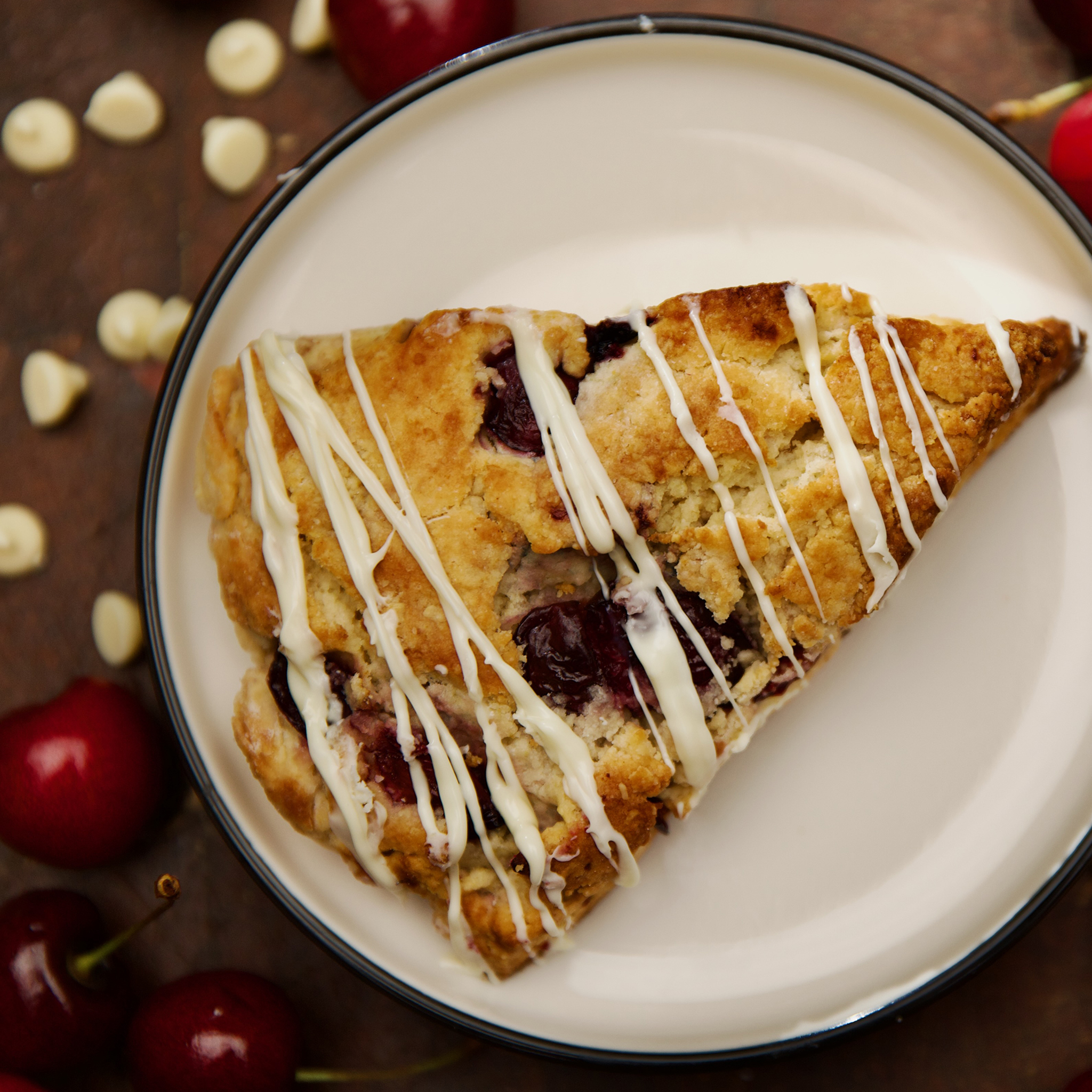 Elizabeth Poett's Cherry-Almond Scones Drizzled with White Chocolate