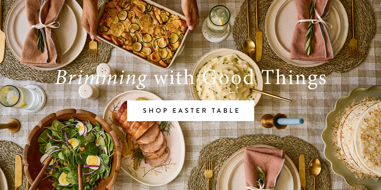 brimming with good things - shop easter table - a table set with multiple dishes from a birds eye view 